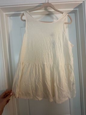 Sleeveless Cream Ruffle Hem Tank Top